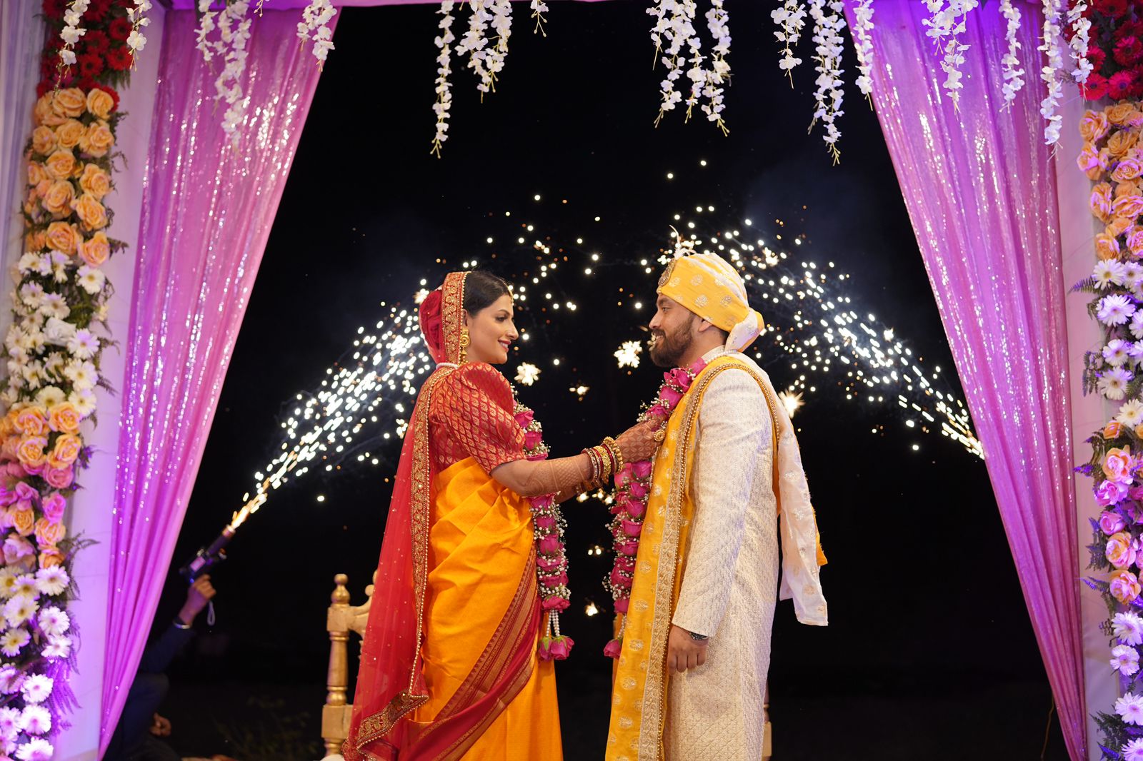 Couple Varmala during a wedding in rishikesh