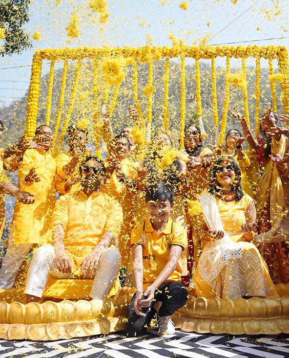 couples and family during haldi ceremony in rishikesh